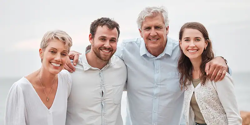 smiling family after using estate planning services