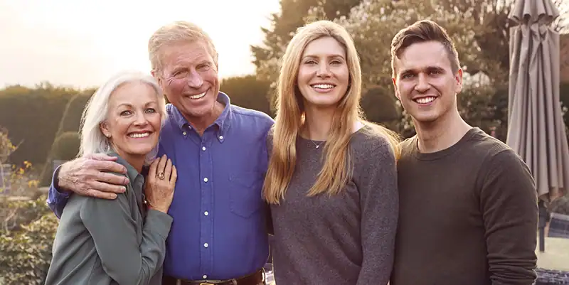 smiling family after using estate planning services
