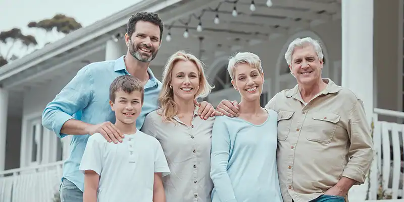smiling family after using estate planning attorneys in Roswell