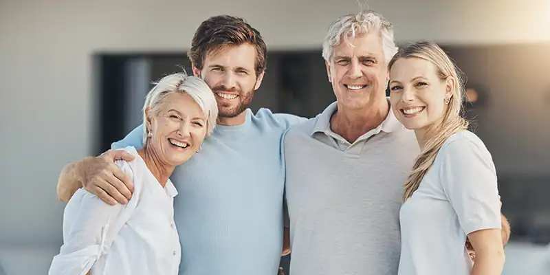 smiling family, illustrating the peace that comes protecting your family's future by working with estate planning attorneys in Alpharetta